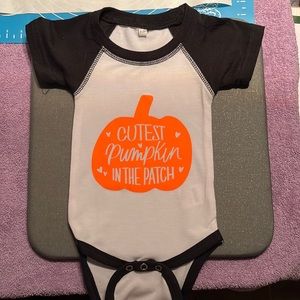 Cricut homemade baby onesie.